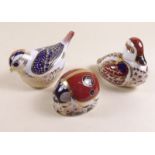 A Royal Crown Derby paperweight Swimming Duckling, ladybird and another bird