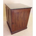 A 19th century mahogany double sided cabinet, the two doors enclosing shelves, 66cm x 71 x 89 high