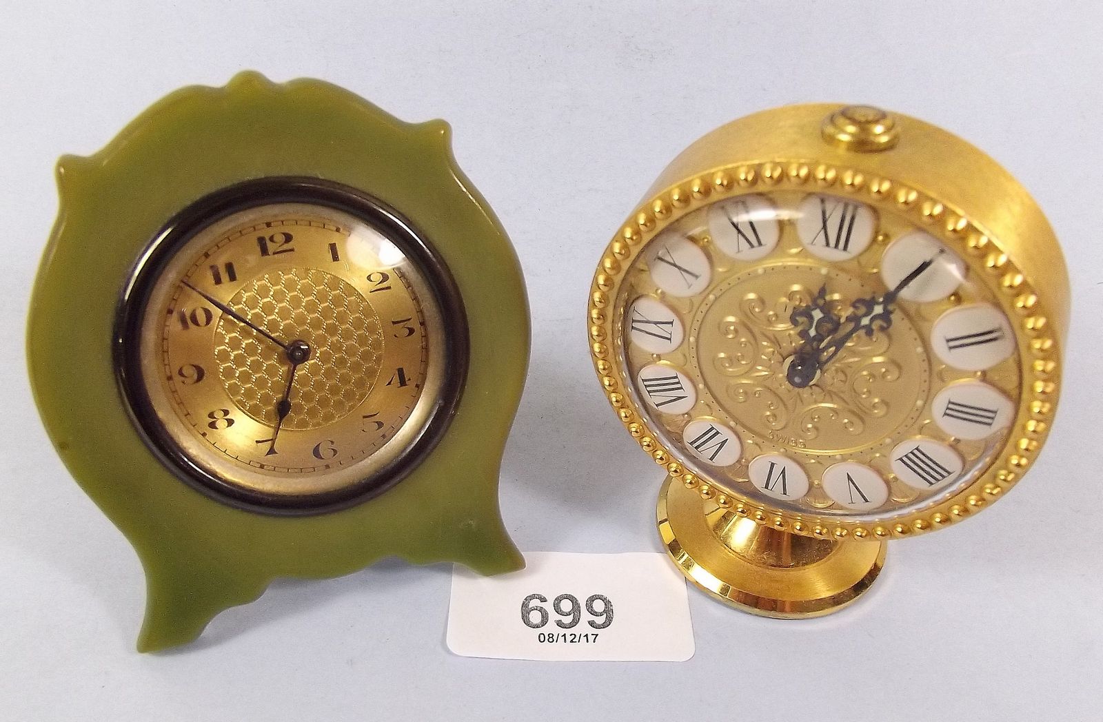 An Imhof gilt alarm clock and a 1930's Bakelite travel clock