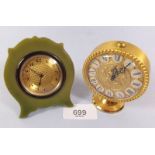 An Imhof gilt alarm clock and a 1930's Bakelite travel clock
