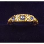 A 9 carat gold sapphire and diamond ring, size N