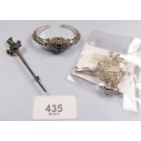 A silver marcasite and green paste watch and matching brooch and a Swarovski reindeer brooch
