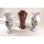 A pair of floral painted vases and a mottled vase