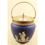 A Wedgwood Jasperware biscuit barrel with silver plated lid