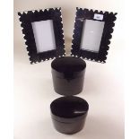 A pair of black horn and bone veneered photograph frames 23 x 18cm and a set of oval lacquered