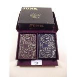 A set of Bezique cards boxed and sealed and 'Junk' playing cards boxed and sealed