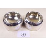 A pair of Britannia standard silver trencher salt pots with gilt interiors, London 1898