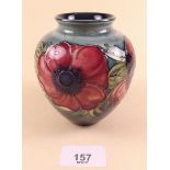 A Moorcroft vase painted Anemone pattern - 11cm