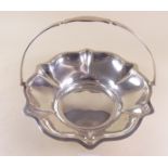A silver bread or fruit basket with swing handle, Sheffield 1925, 345g