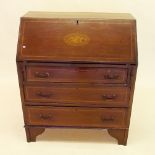 A small Edwardian mahogany bureau with marquetry decoration to slope front all over drawers, 76cm