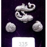 An 800 standard marcasite double fish brooch and a similar pair of earrings