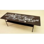 A Terence Conran for Habitat black coffee table circa 1964 decorated grasses and seedheads