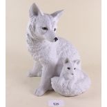 A bisque porcelain alpine fox and cub - 23cm
