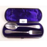 A silver christening spoon and fork set, London 1875 - cased