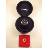 A Scuderia Ferrari wrist watch in fitted case with instructions