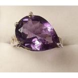 A silver and amethyst ring, size P