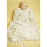 A reproduction bisque headed doll with impressed mark Grace R Putnam