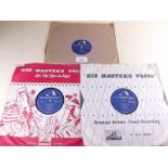 Three Elvis Presley 78rpm records: Hound Dog, Blue Suede Shoes and My Baby Left Me
