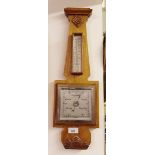 An Art Deco light oak barometer/thermometer