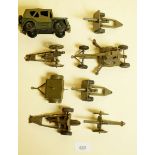 A Britains Army Jeep, a trailer and six field guns