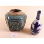 A Japanese pottery jar (lacking lid) and a blue and white vase