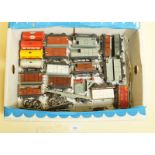 A box of Hornby Dublo three rail freight wagons including four tanks, fish, box vans, bolsters,