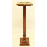 A Victorian mahogany reeded torchere or plant stand