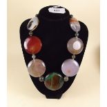 A heavy stone panel necklace