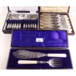 A pair of silver plated fish servers, set of dessert spoons and fish cutlery set