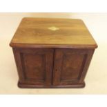 A Victorian walnut cutlery cabinet with six drawers enclosed by burr walnut pair of doors, plus part