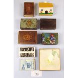 A box of match box covers including treen etc.