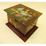 A small decorative blanket chest with all over still life fruit painted decoration, 61 wide x 48