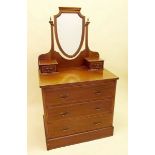 An Edwardian dressing chest with swing mirror over two short and two long drawers , 60.5cm wide
