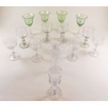 Four small 18th century wine glasses with etched decoration, four engraved ferns and four with green