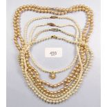 Five various simulated pearl necklaces