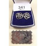 A Victorian silver panel brooch and a pair of silver celtic earrings