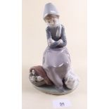 A Lladro figure of a seated girl with basket and ducks