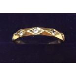 A 9 carat gold eternity ring set diamonds, size P