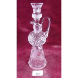 An Edinburgh Crystal liqueur decanter with thistle form measure stopper and engraved decoration