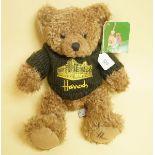 A brown Harrods bear in jumper