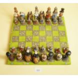 An Alice in Wonderland chess set purchased from Whiteleys