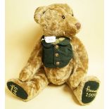 A Harrods Bear - 1849 - 1999 in green waistcoat