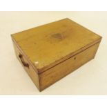 A large light oak cutlery box with two brass handles