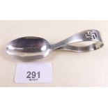 A silver Mappin and Webb caddy spoon with swastika motif - London 1916