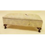 A Victorian small low upholstered foot stool with rise top lid, 76cm long