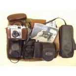 A box of old cameras including Zeiss Ikon Contina, Olympus A2 etc