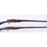 Two Moroccan Afedali muskets with 56 ins decorated full stocked barrels, with six decorated brass