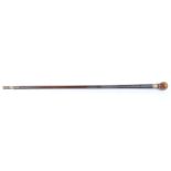 .410 Walking stick shotgun with wood covered cane (a/f), concealed trigger, wooden ball knob handle.