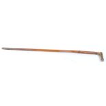 9mm Walking stick cane covered shotgun with button trigger and horn handle. The Purchaser of this