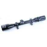 3-9 x 40 Zoom Milcana scope with 11 mm foll off mounts